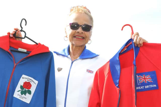 Anita with her official tracksuits for England and Great Britain