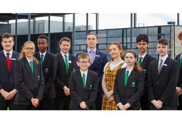 Staff and pupils at Corby Business Academy.