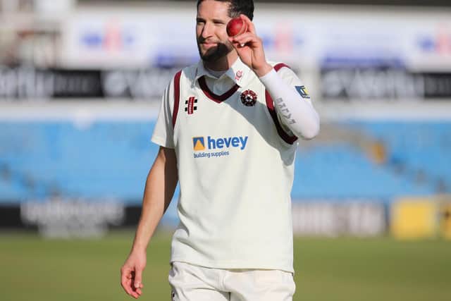 Wayne Parnell raises the match ball in celebration of his five-wicket haul for Northants (Pictures: Pete Short)