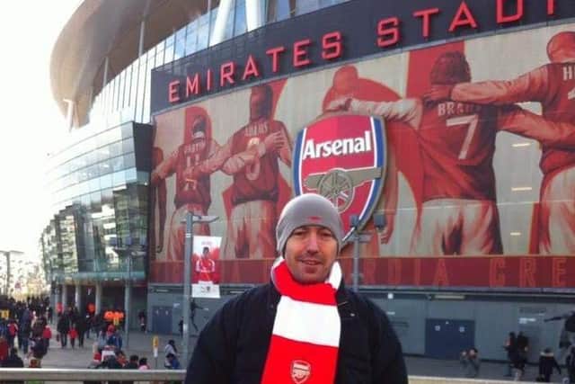 Arsenal fan Neil outside the Emirates Stadium. Photo: Rebecca Strangward