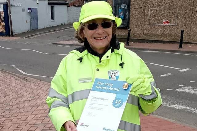 Sandra Guy with her long service award