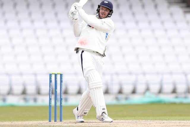 David Willey hits out on his way to a crucial 41 not out for Yorkshire