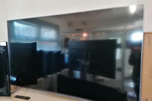This monster TV was among the goods crooks carried away after breaking in to a Wellingborough shop on Monday night