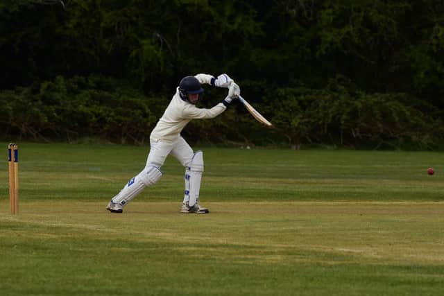Aiden Garret plays an attacking shot for Cogenhoe IIs