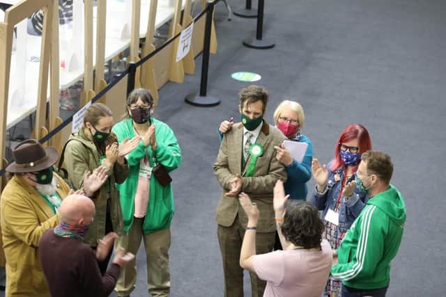 Green Party members celebrate another successful day