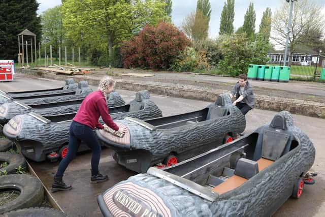 The boats for log flume Rocky River Falls are wheeled out