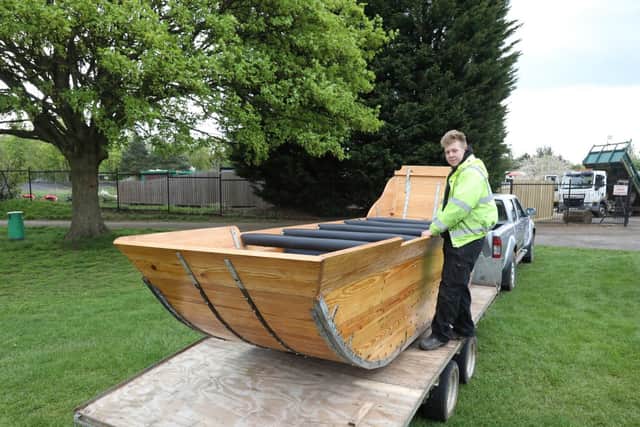 Rhys Woolf with Water Chute boat - that has been refurbished