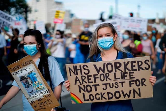 Health workers marched on Downing Street last July to make their case for a decent pay rise.