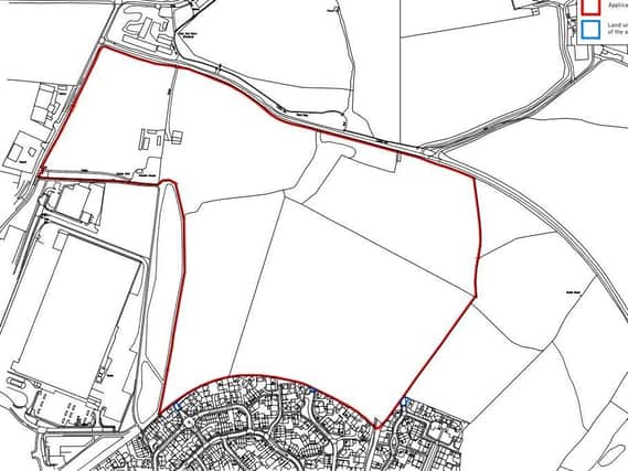 The development site, outlined in red.