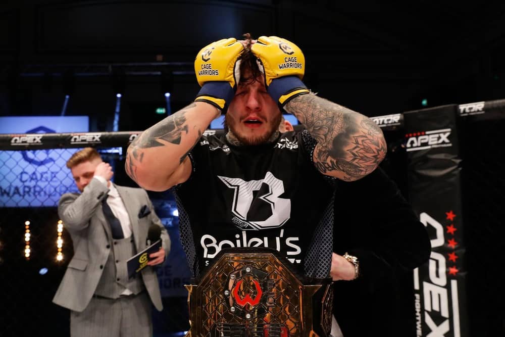 Corby’s Jordan Vucenic defeated Morgan Charrière to clinch the Cage Warriors featherweight championship in March. Picture by Dolly Clew