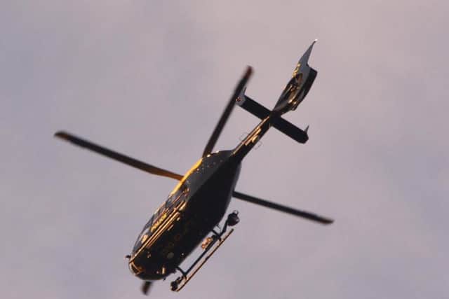 The police helicopter over Corby earlier this evening. Image courtesy of Shane Davis.