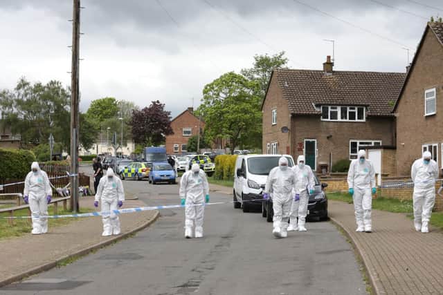 Forensics officers at the scene.