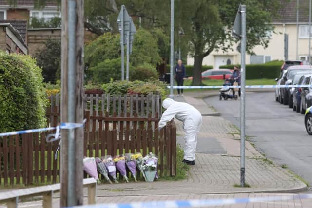 Forensics officers at the scene.