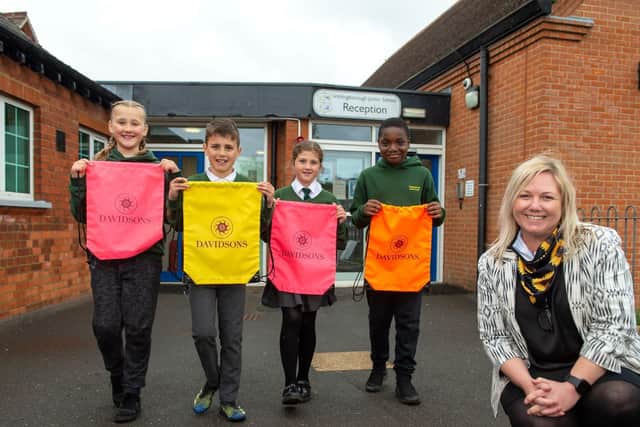 Alison Humber of Davidsons Homes with Irthlingborough Junior School pupils