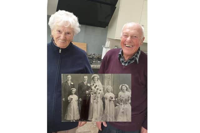 Betty and John with their original wedding photo