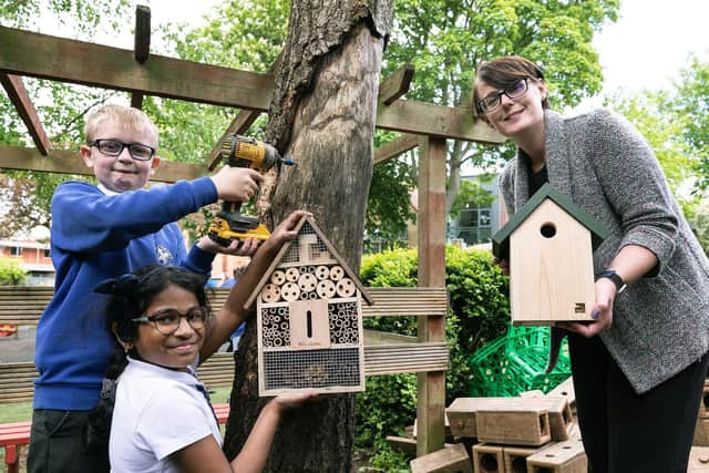 Pupils from St Andrew's Primary with Yvette Christy from Tilia Homes