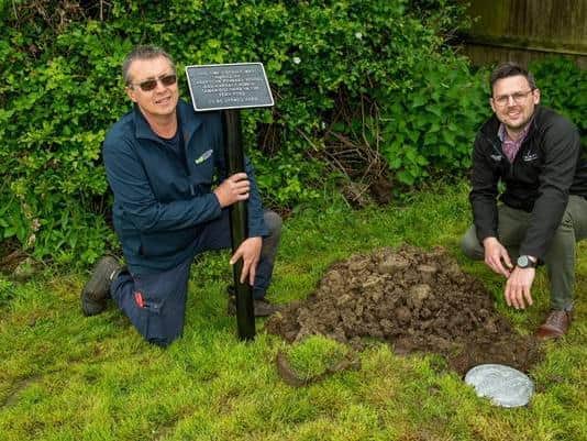 Simon Odell from Mintridge (left) and Luke Shepperson (right) with the time capsule at Charter's Gate