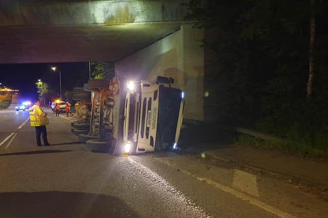 The lorry overturned after crashing into Wooldale Road Bridge in Wootton.
