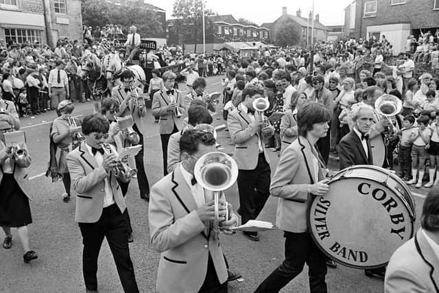 Corby Silver Band parades through the Old Village