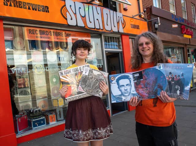 Chris Kent and his daughter Roxy outside Spun Out in Northampton.