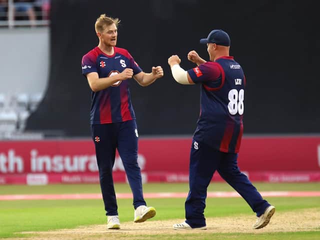 Tom Taylor celebrates one of his three wickets with Richard Levi (PIctures: Peter Short)
