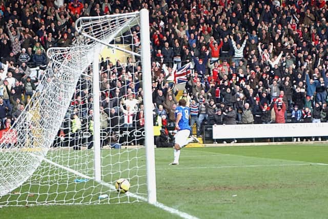 Mike Capps captured the moment the ball rolled into the net and Brett Solkhon wheeled away after opening the scoring for Kettering Town against Notts County in their famous FA Cup run in the 2008-09 season