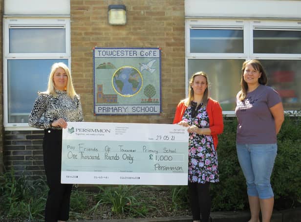 Friends of Towcester Primary School accepting the donation from Persimmon Homes.