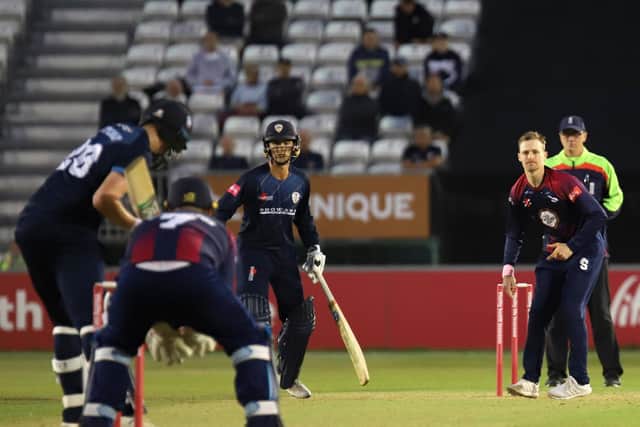 Graeme White sends down a delivery
