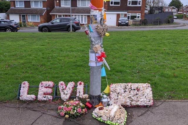 Floral tributes left at the scene.
