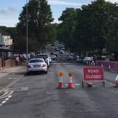 Part of Kettering Road is closed following reports of flooding on Tuesday morning