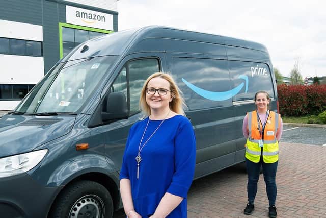 Tessa Taylor, from KidsAid, pictured with Amazon operations manager, Verity Barber.