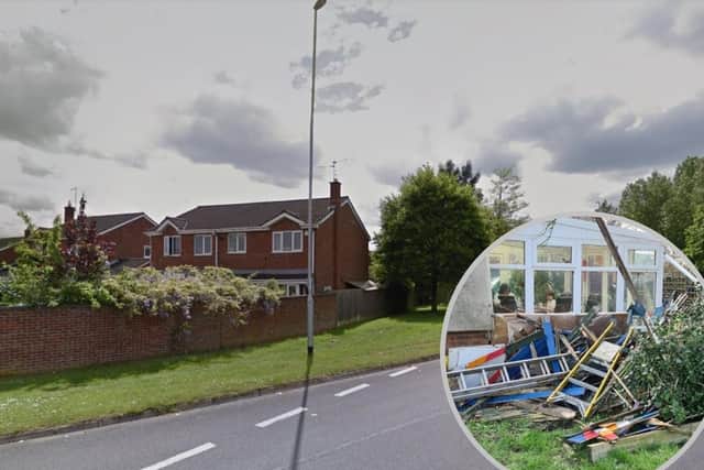 A shed and fence were demolished during the crash