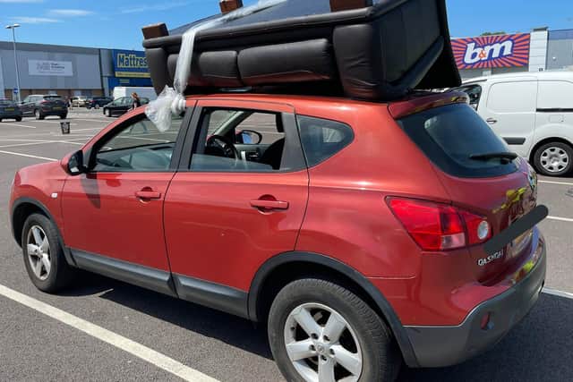 Police spotted the car with added furniture in the car park of a Towcester Road retail park