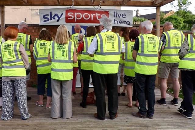 Wombles members with their high-vis vests.