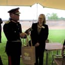 Rachel Lindsay and Gina Lewis of Queen's Award for Enterprise winners Farrington Oils with Lord-Lieutenant of Northamptonshire James Saunders Watson at Rockingham Castle