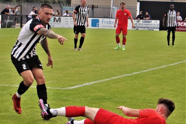 Callum Westwood in action during Corby Town's 4-2 friendly win over Melton Town at Steel Park. Pictures by David Tilley