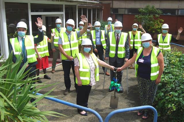 Macmillan Partnership Manager for Northamptonshire, Rachel Atkinson,(L) and KGH Macmillan Head of Nursing for Cancer, Ruth Giles, (R), hold a spade to symbolically mark the start of work on the new Macmillan Cancer Support Centre. They are with representatives from Macmillan (Centre Manager, Danielle Mellows) Marshdale Construction ( MD Ben Edgar and Project Manager Peter Howell) GSS Architecture (Architect Andrew Vallis) GSS LLP (Quantity Surveyor Karen O’Connor and Partner Paul Vega) KGH (Leanne Hackshall, Director of Nursing and Quality, Director of Facilities and Estates, Ian Allen, Building Officer, James Conway) and patient representative (Mark Rodwell.)