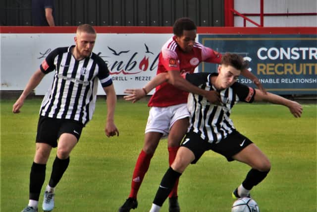 Action from Corby Town's 4-1 defeat at Brackley Town. Picture by David Tilley