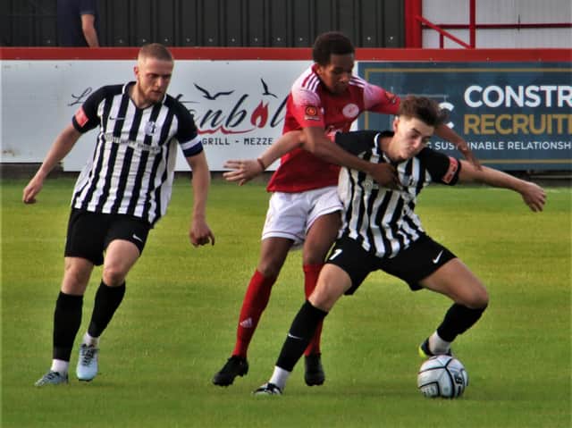 Action from Corby Town's 4-1 defeat at Brackley Town. Picture by David Tilley