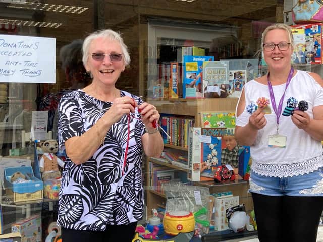 Margaret Wride (left) with manager of Age UK charity shop in Rothwell, Natasha McAlindon (right).