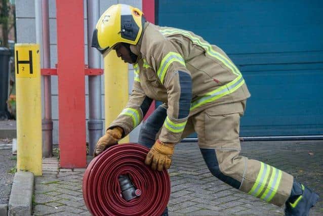 A hose reel was used to extinguish the fire in the refuse lorry.