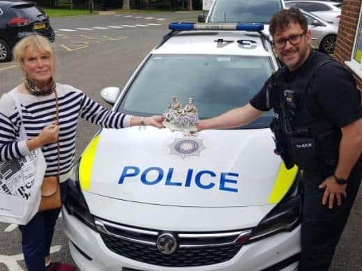 Catherine Merry collects the ornament stolen from her parents in 1986