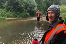 Grow Wild members Samantha and William taking part in a river clean up at Geddington Ford