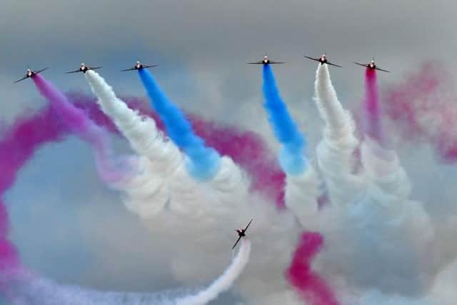 Grey skies greeted the Red Arrows over Silverstone in 2017 — but tomorrow promises to be hotter