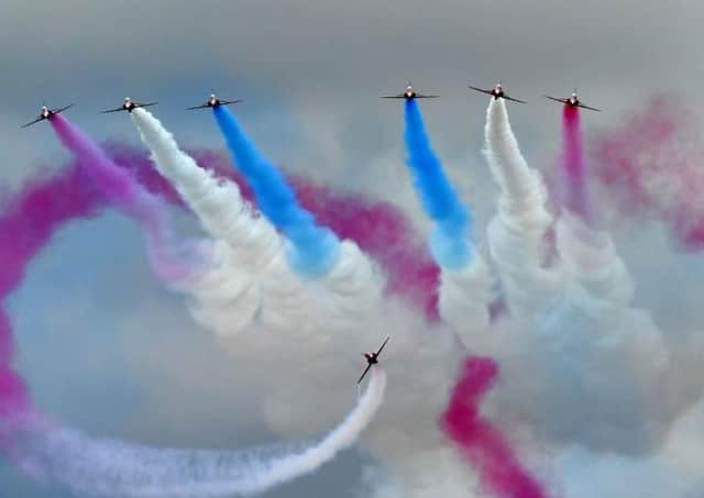 Grey skies greeted the Red Arrows over Silverstone in 2017 — but tomorrow promises to be hotter