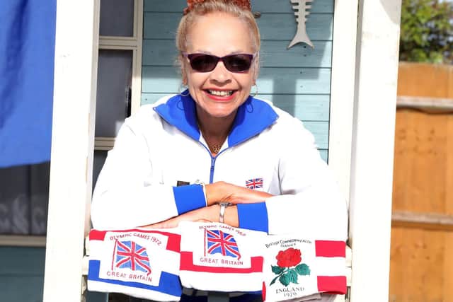 Anita with some of her running tops