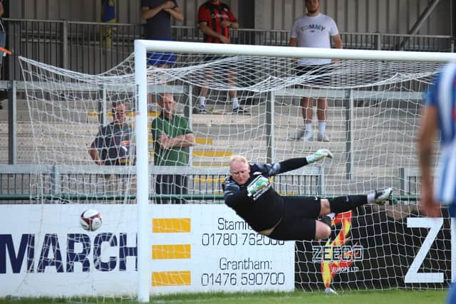 Callum Powell's free-kick finds the net for Kettering Town's equaliser in their 3-1 friendly win at Stamford. Pictures by Peter Short