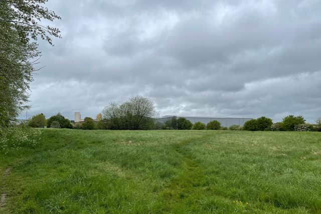 The land is bordered by the industrial estate, the railway and Stephenson Way.