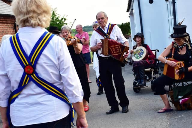 Braybrooke Morris Dancers finally shook off the shackles of lockdown by performing a variety of traditional hankie and stick dances outside the Bulls Head at Arthingworth.