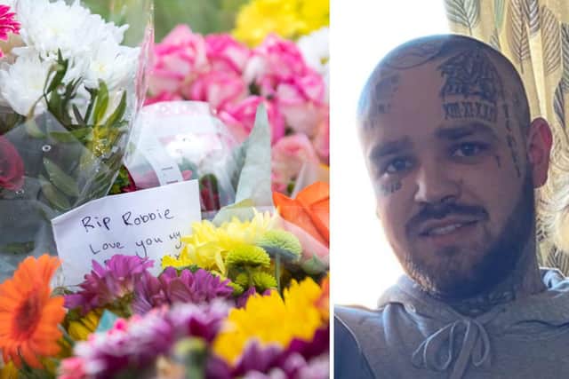 Flowers and tributes to Robbie Fitzpatrick have been left at the roadside